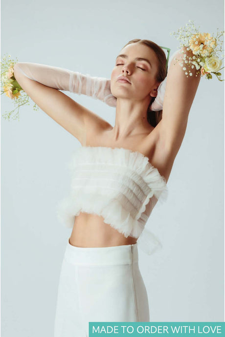 Model wears Ella ivory bandeau
